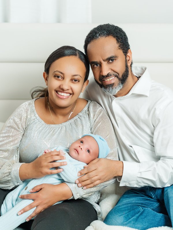 Kevin Socola Films multicultural newborn photography DMV couple baby blue beanie lifestyle