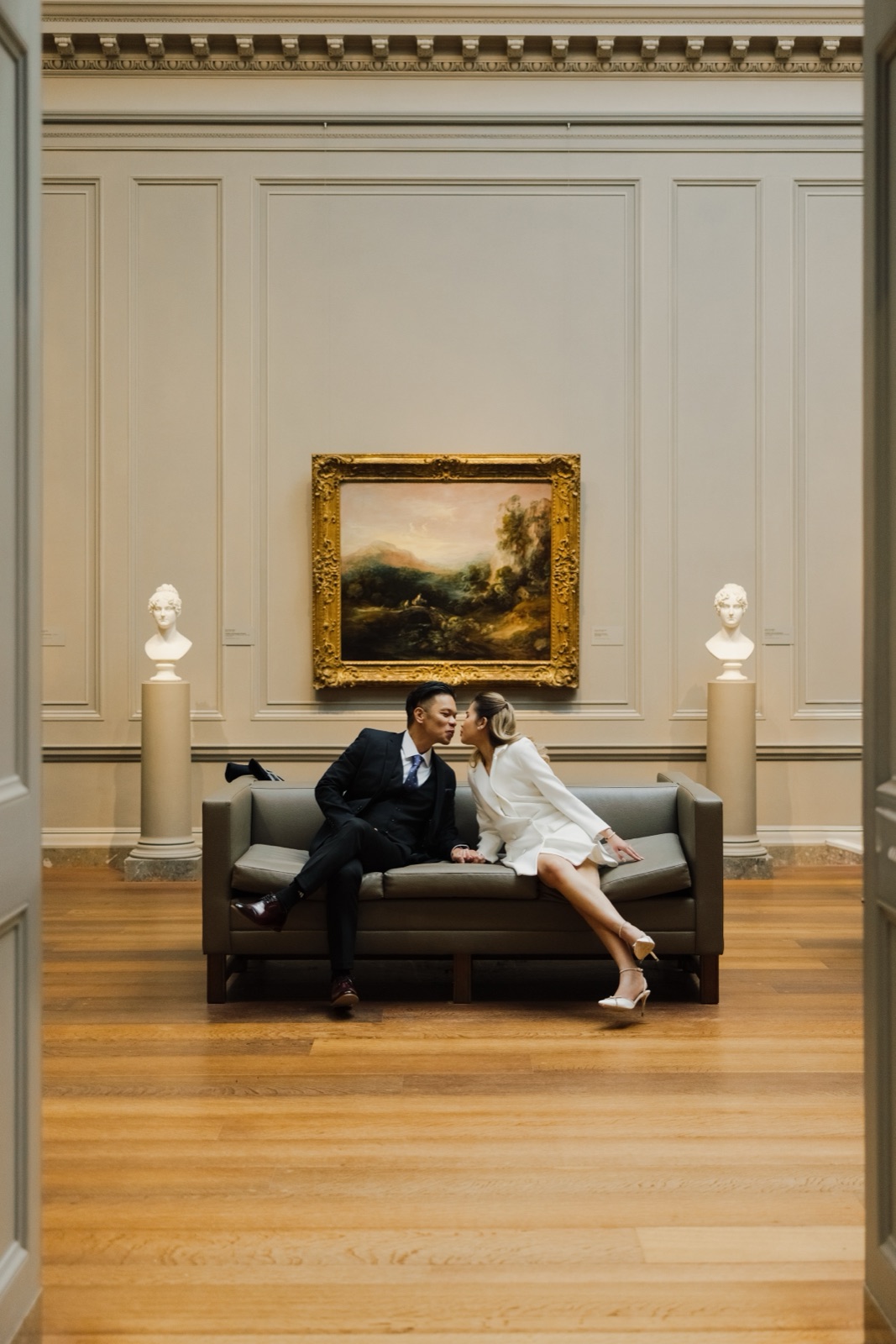 Couple seated in a gallery room at the National Gallery of Art in Washington, DC by Kevin Socola Films