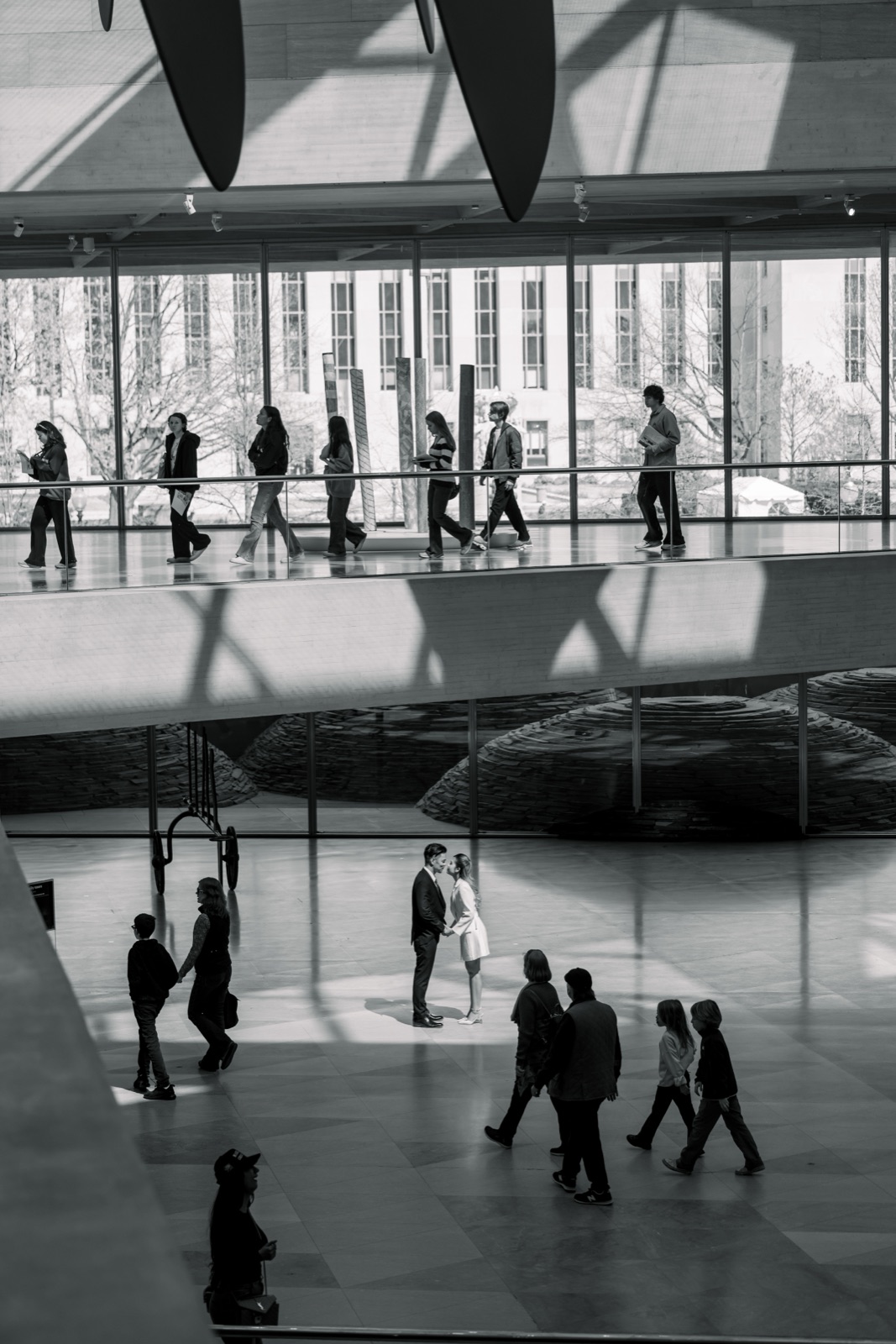 Black and white editorial portrait in the East Building atrium at the National Gallery of Art, Washington DC by Kevin Socola Films